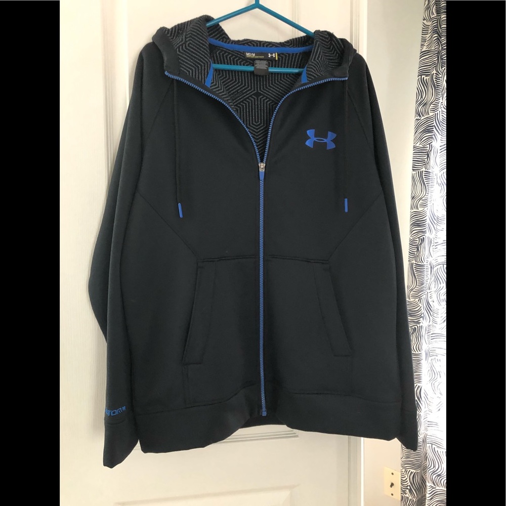 Men’s Under Armour zip up with fleece lining.